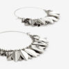 Boucles d&rsquo;oreilles métalliques brillantes en forme de feuilles