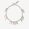 Bracelet en métal brillant avec pendentifs en forme de feuilles