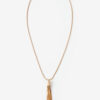 Collier long Naoki en laiton doré avec pompon Collier long Naoki en laiton doré avec pompon