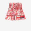 Jupe Naomi en voile de coton smocké avec imprimé bandana Jupe Naomi en voile de coton smocké avec imprimé bandana